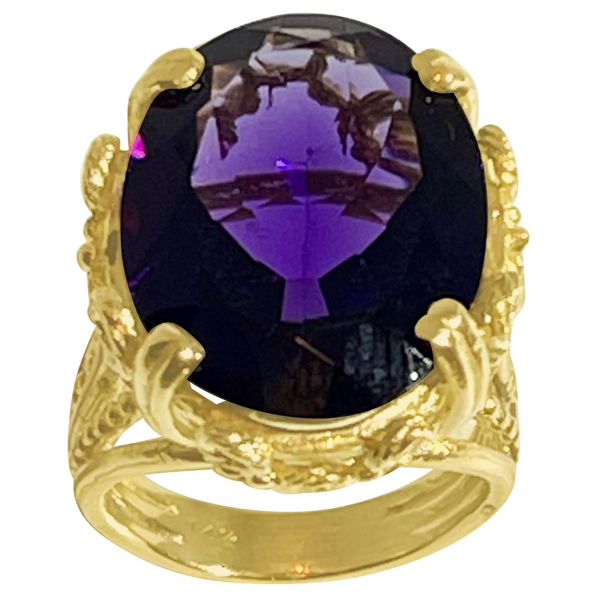 Approximately 13 Carat Beautiful  Amethyst Cocktail Ring in 14 Karat Yellow Gold Size 5.5
This is a Beautiful Cocktail ring ring which has a large approximately 13  carat of high quality Amethyst . Color and clarity is extremely nice. Large Oval cut