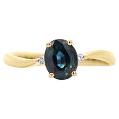 1.3 Carat Oval Cut Blue Sapphire and Diamond 3 Stone Curvy Ring