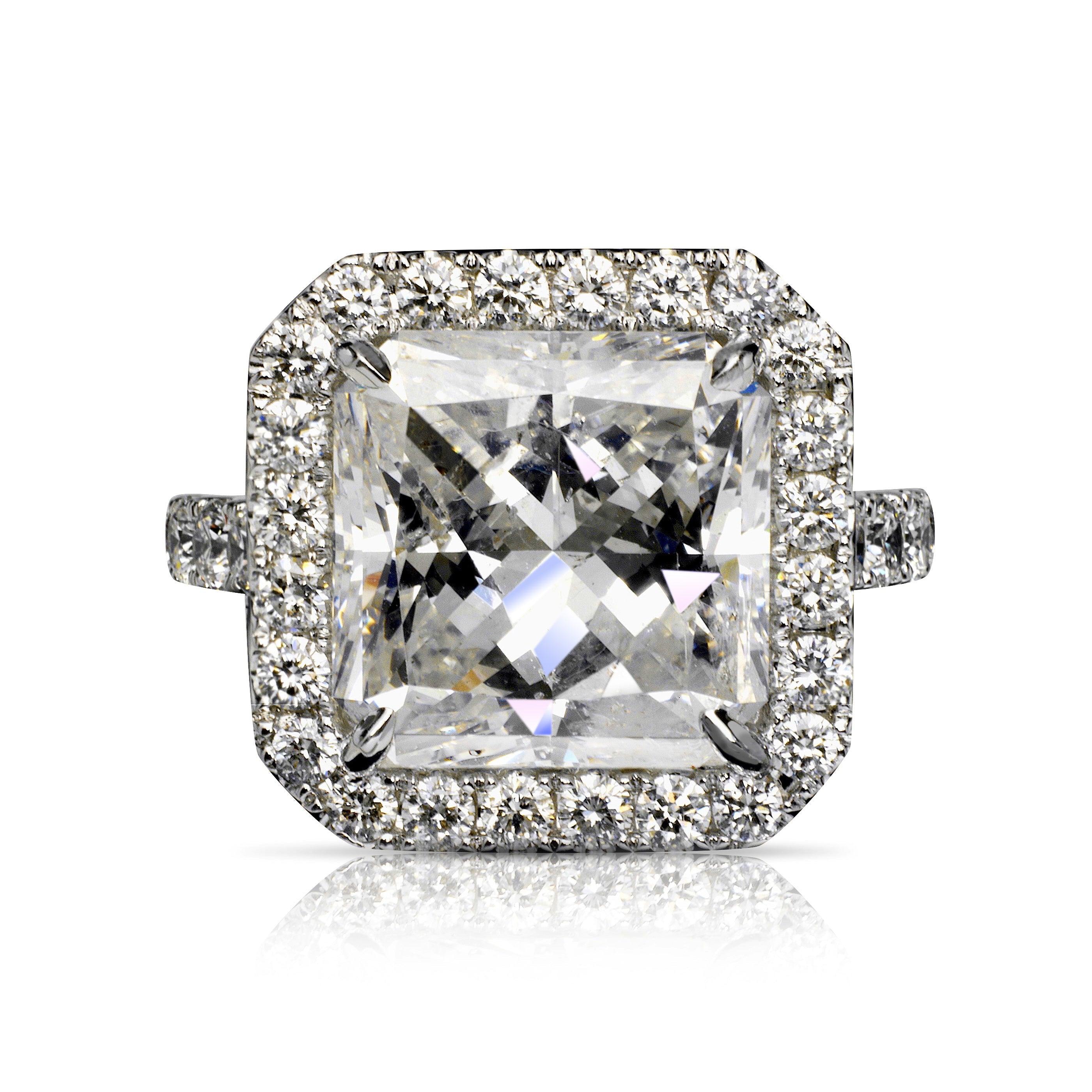 SKY RADIANT CUT HALO DIAMOND ENGAGEMENT RING PLATINUM BY MIKE NEKTA
CERTIFIED

Center Diamond:
Carat Weight: 10.45 Carats
Color :  E
Clarity: SI1*
Style:  RADIANT BRILLIANT
Measurements: 12.03 x 11.99 x 8.66 mm
* Clarity Enhanced
 
Ring:
Metal: 18K