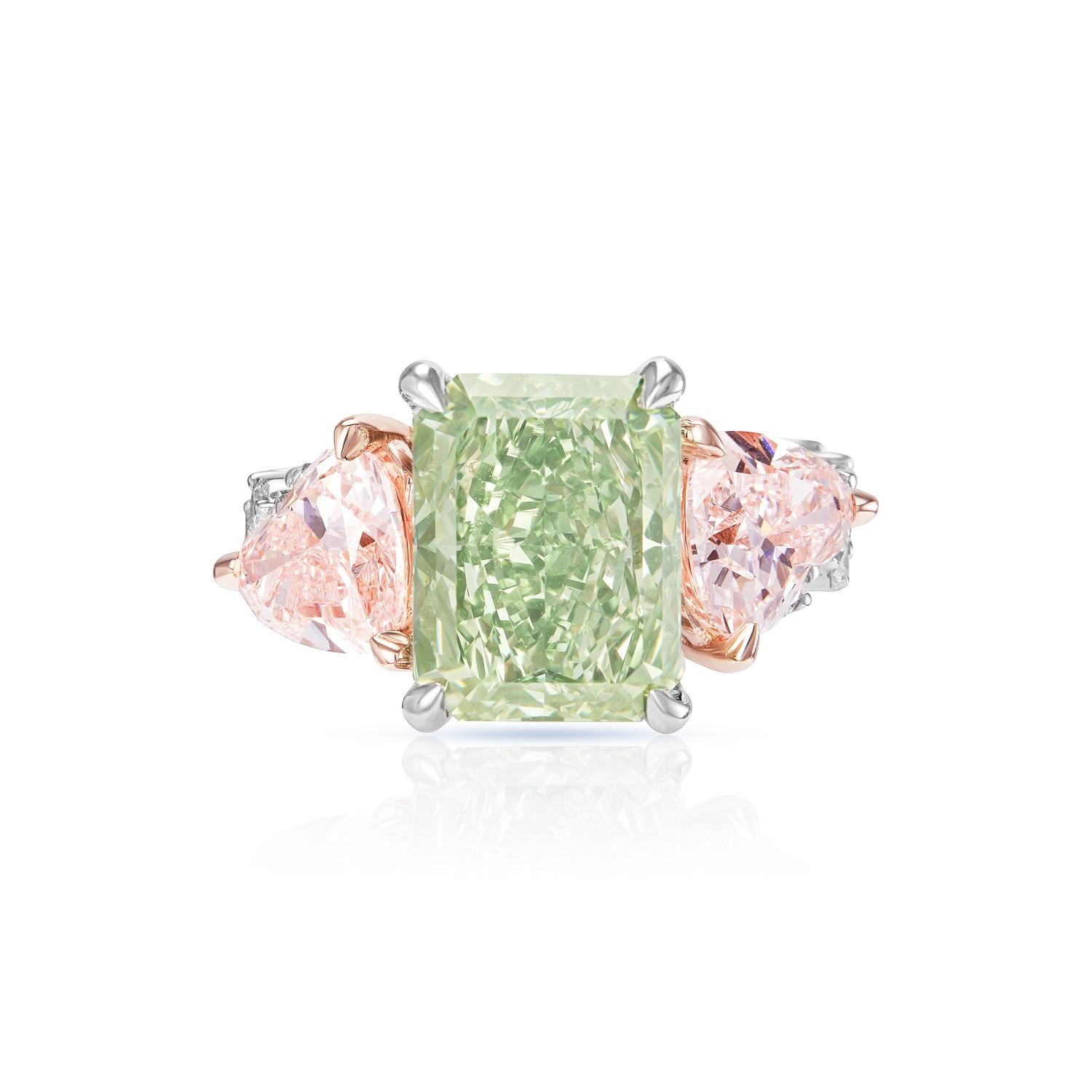 Looking for a truly unique and stunning engagement ring? Look no further than a center earth-mined diamond. This 6.05 carat radiant cut stone is beautifully crafted, boasting a flawless Fancy Intense Green color and excellent clarity. The ring