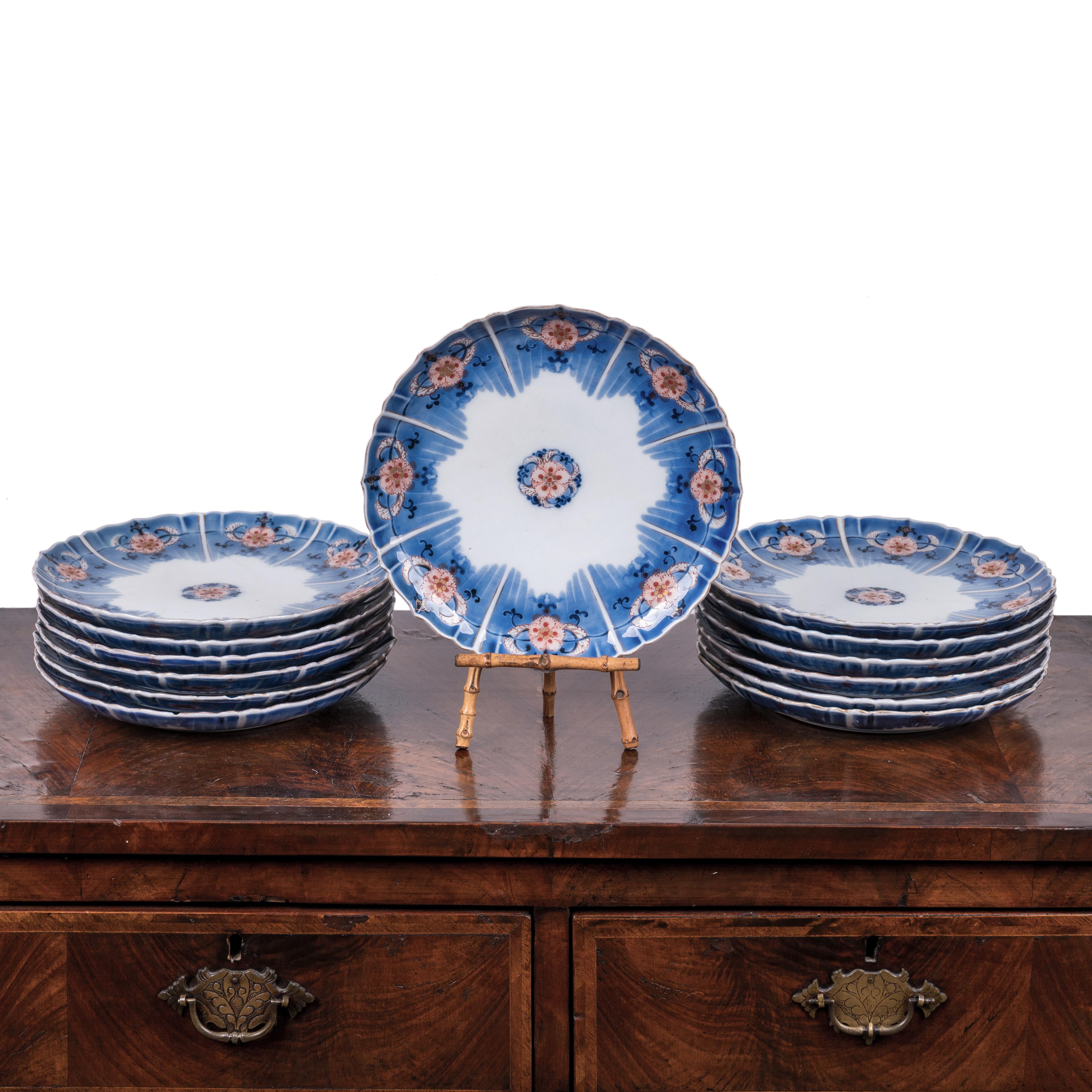 A rare group of 13 matching Chinese Kangxi imari decorated plates, 18th century.  Nine inches; each plate with six character Kangxi mark. 

