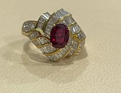 1.3 Carat Natural Oval Burma Ruby and 1.3 Carat Diamond 18 Karat Gold Ring