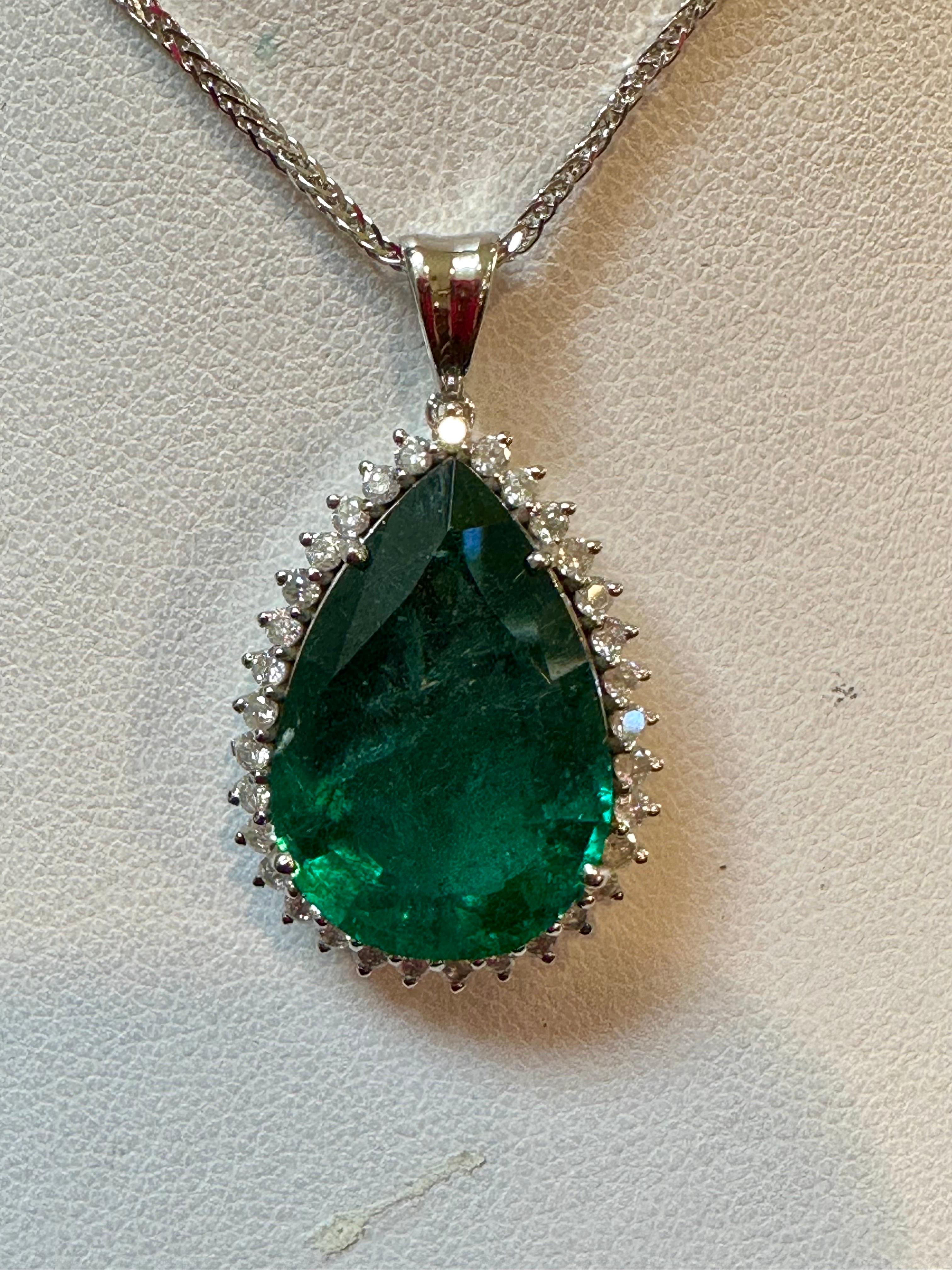 
known weight of 12.75 Ct Pear Cut Emerald & 1 Ct Diamond Halo Pendent/Necklace 14 Kt White Gold Chain 18 