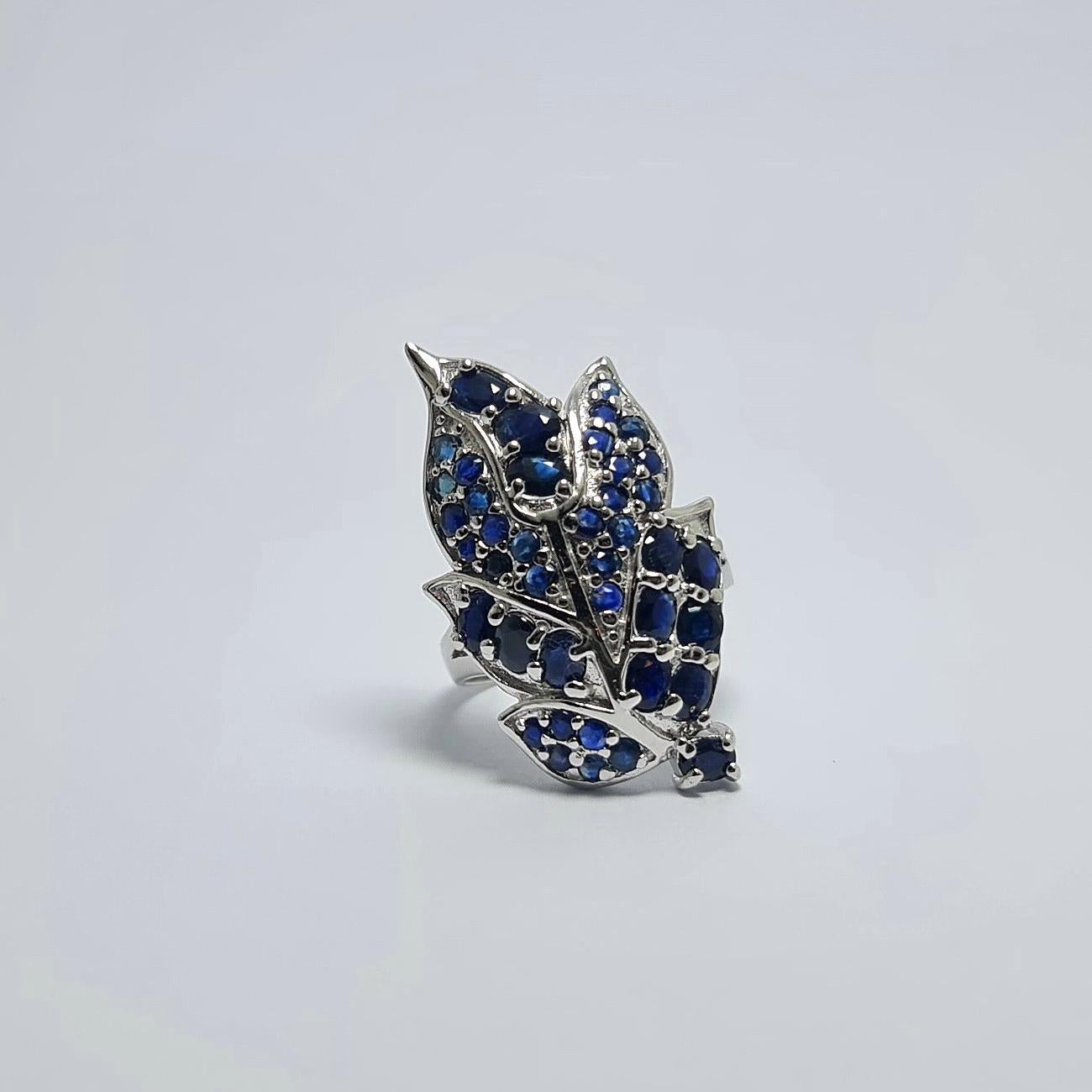 13 CTS untreated Natural Blue Thailand  Sapphires set in .925 Sterling Silver Rhodium plated Leaf Design  Ring 