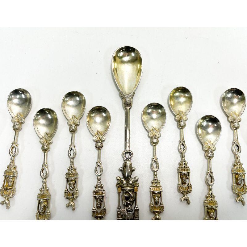 13 Dutch silver figural apostle berry or ice cream flatware set spoons, 1847

The spoons with various apostles to the finial and female angels towards the bowl. An indistinguishable inscription to the edge of the bowl of the smaller spoons. The