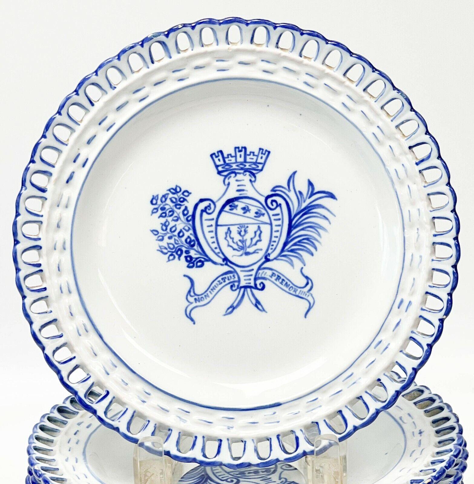 13 (12+ a spare) Emile Galle France Reinemer Nancy Faience reticulated porcelain plates circa 1880. A white ground with blue decoration to the center featuring the coat of arms of the town of Nancy, France. The crest features a crown over a shield