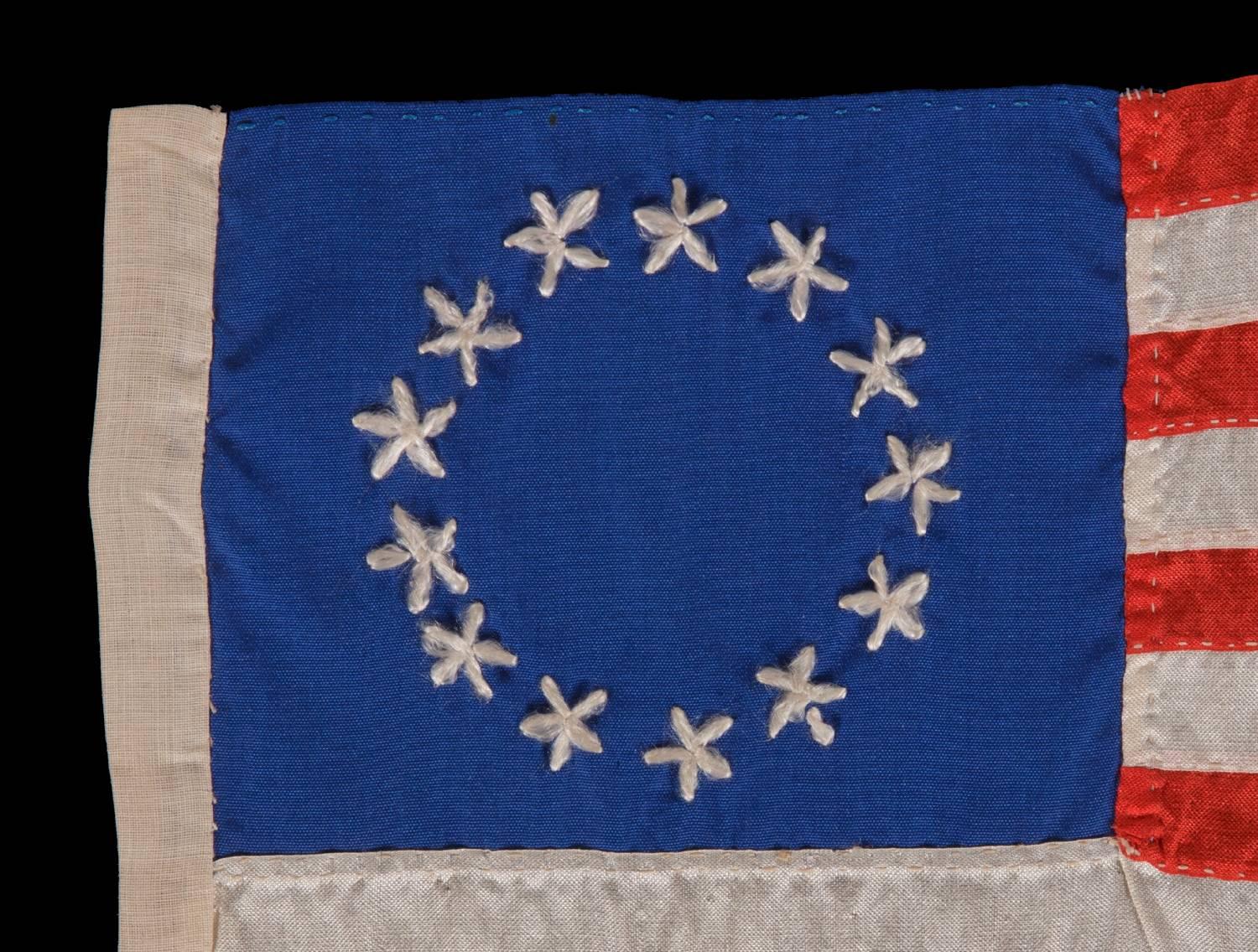 13 hand-embroidered stars and expertly hand-sewn stripes on an antique American flag made in Philadelphia in by Rachel Albright or Sarah M. Wilson, granddaughter and great granddaughter of Betsy Ross, 1898-1913:

13 star American national flag,