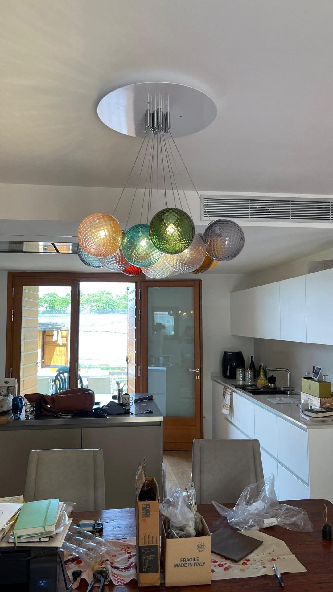 Italian 13 lights ceiling chandelier with colored transparent Murano glass spheres For Sale