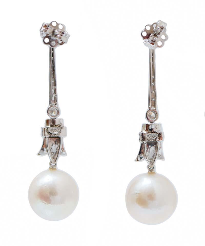 Rétro Boucles d'oreilles de 13 m de perles, diamants et platine en vente