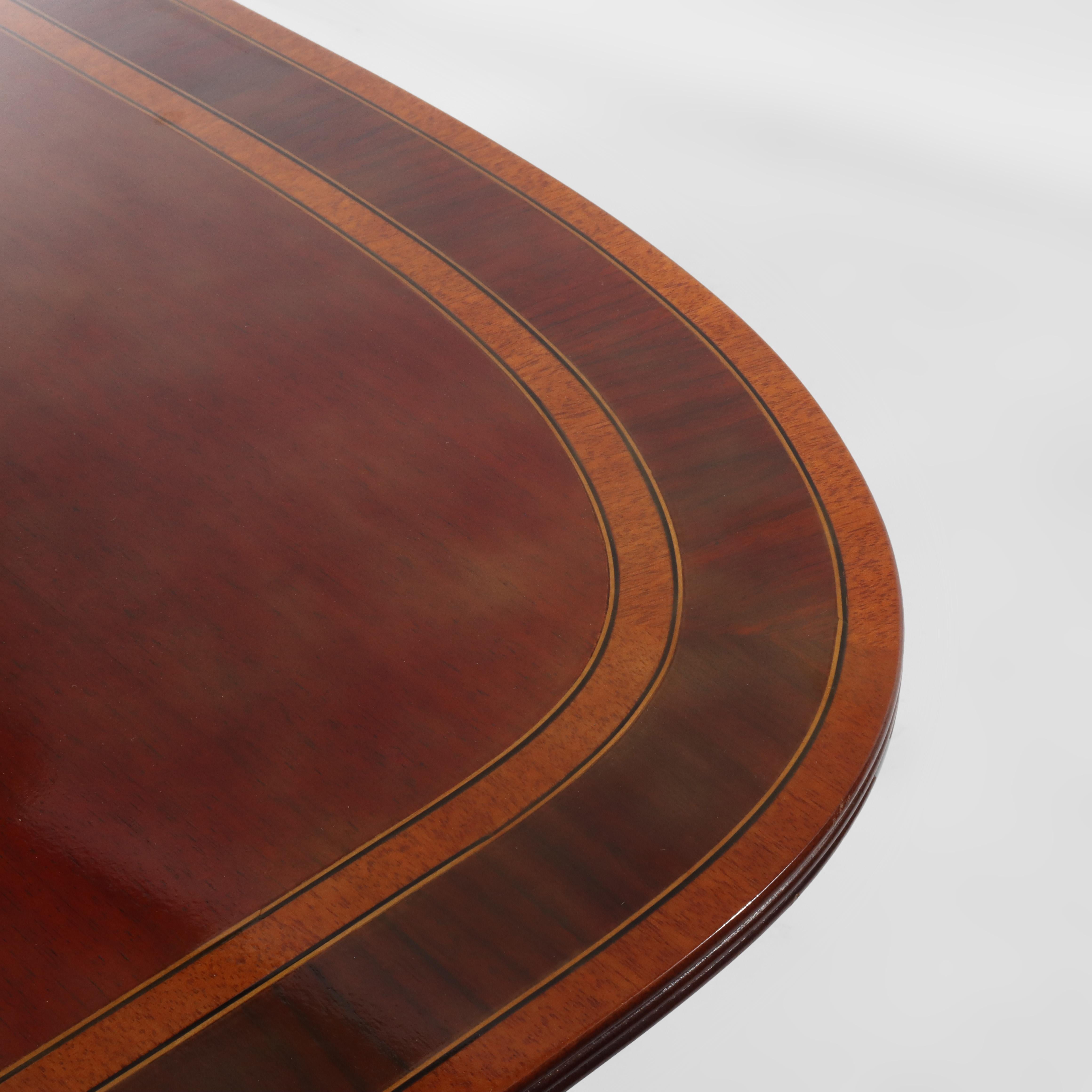 Table de conférence à trois pieds et à bandes croisées en acajou, 13', 20e siècle en vente 2