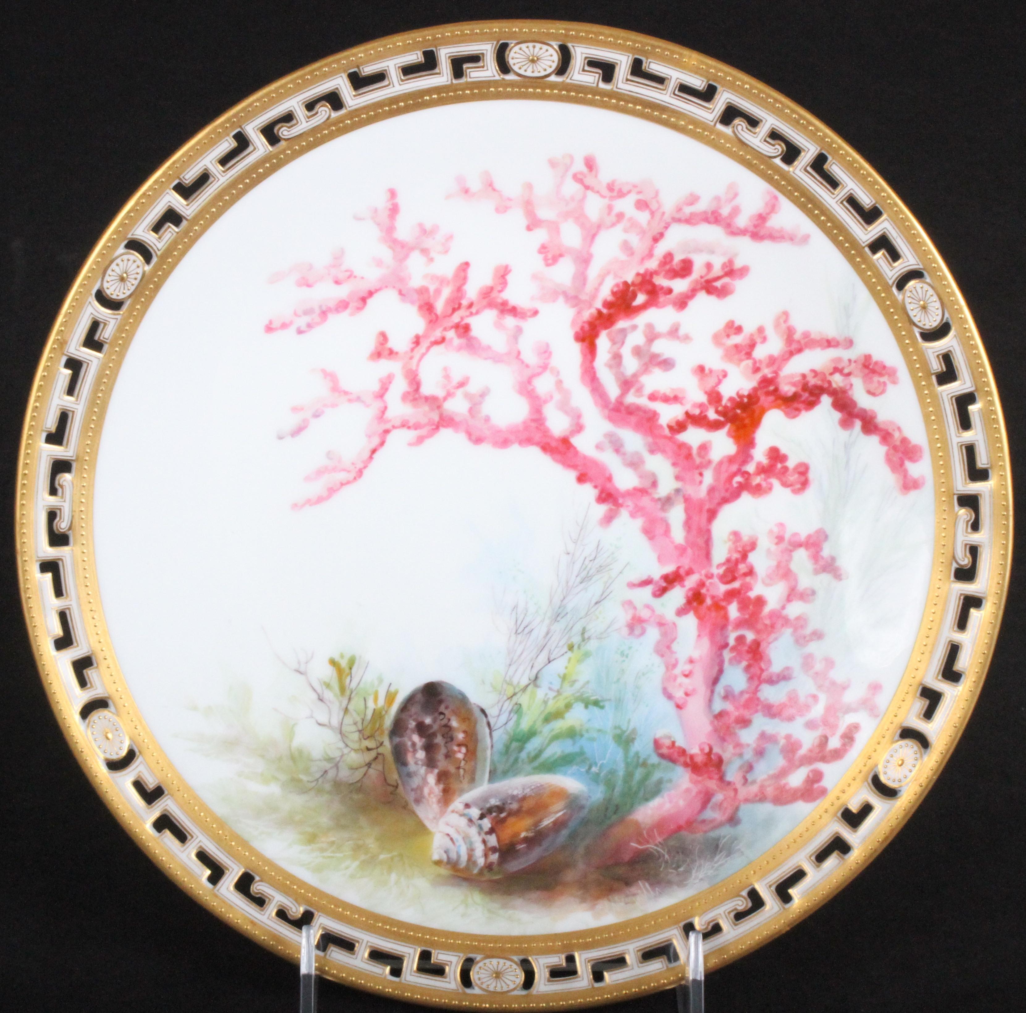 Here is a wonderful set of 13 hand painted cabinet plates by artist William Mussill from Minton, Stoke-On-Trent, Staffordshire, England. Each plate features a unique rendering of shells or coral in a naturalistic and colorful tropical setting. The