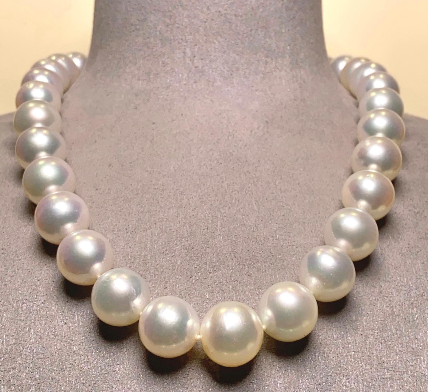 A Strand of an Impressive White South Sea Pearl Necklace with 18K Gold Clasp. The size of the pearls are ranging from 13mm-15mm. This is a very elegant pearl necklace and is perfect for any occasions. 

A 13 mm to 15.6 mm White South Sea Pearl