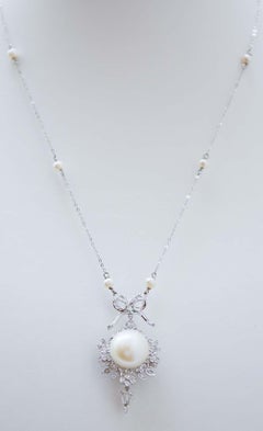 13 Mm Pearl, Diamonds, Pearls, Platinum and White Gold Pendant Necklace.