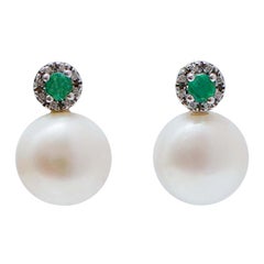 13 Mm Pearls, Emeralds, Diamonds, 14 Karat White Gold Earrings.