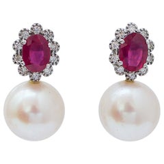 13 Mm Pearls, Rubies, Diamonds, 14 Karat White Gold Earrings.