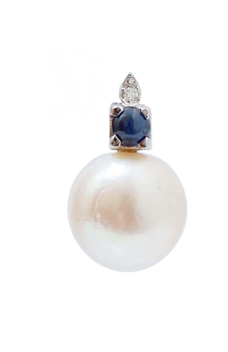Superbes boucles d'oreilles en structure d'or blanc 14 kt montées d'une feuille sertie de diamants et, en dessous, d'un saphir. Comme pendentif, une perle.
Diamants 0,07 ct
Saphirs 1,11 ct
Perles 6.70 gr
Poids total 8.60 gr
RF +GAHH
RK.AGIH85

Pour