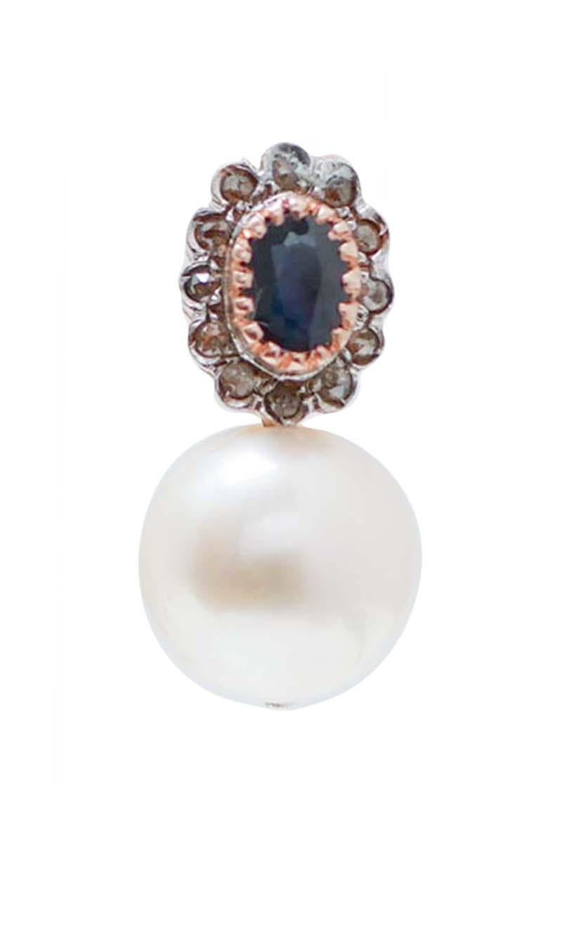 Fantastici orecchini pendenti in oro rosa 9 kt e struttura in argento montata con uno zaffiro in una cornice di diamanti. Come ciondolo, una perla bianca.
Diamanti 0.73 ct
Zaffiri 1,95 ct
Perle 6,10 gr
Peso totale 10.30 gr
RF  *REH
RK.GFH98


Per