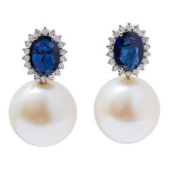 13 Mm White Pearls, Diamonds, Sapphires, 18 Karat White Gold Earrings.