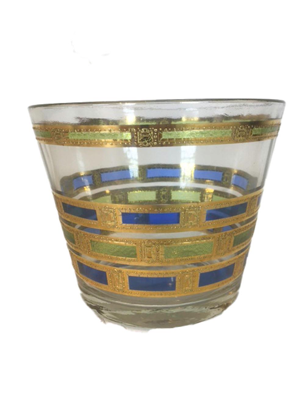 Vintage culver glassware, 13 piece barware set in the Empress pattern. Including 1 ice bowl, 6 highball & 6 rocks glasses, all decorated with bands of blue and green translucent enamels with 22-karat gold.

Measures: 1 - Ice bowl: 4-3/4