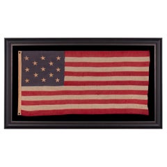 Antique 13 Star American Flag with Stars in a 3-2-3-2-3 Pattern on a Dusty Blue Canton