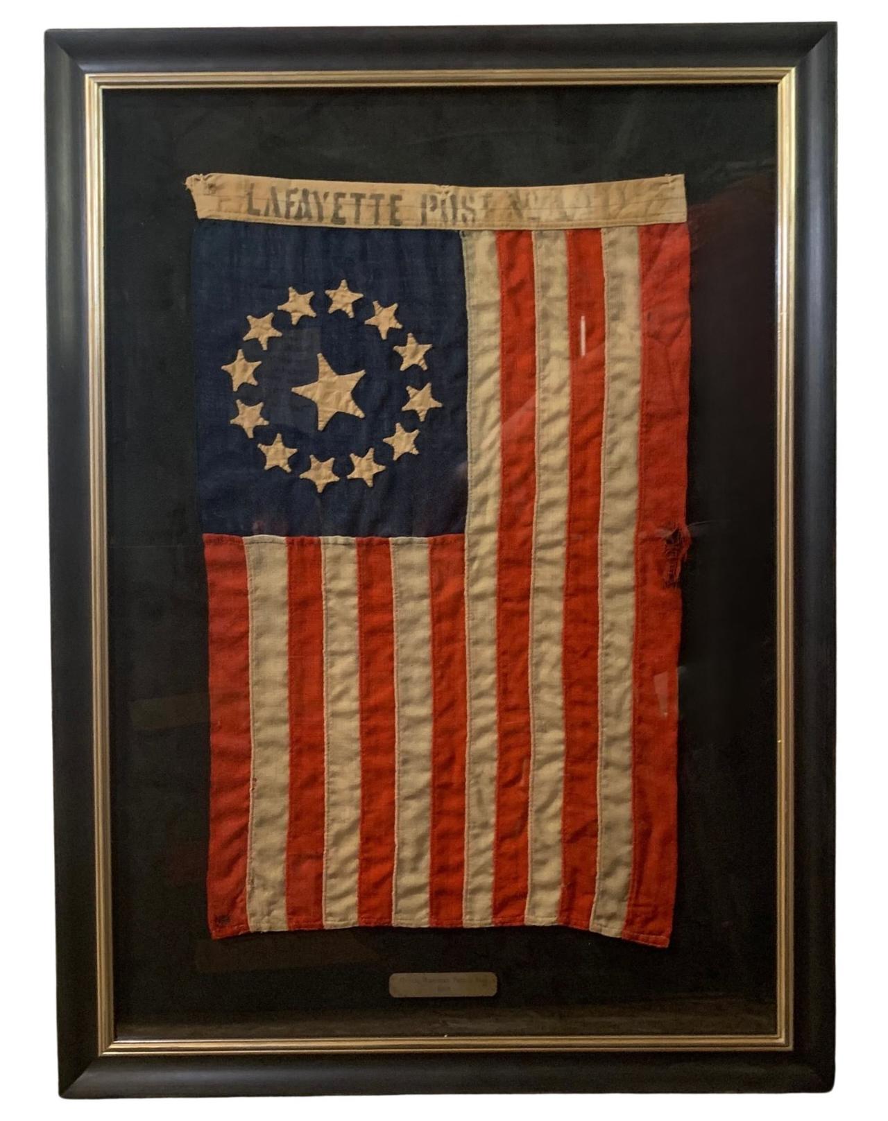 Presented is a stunning 13-star American parade flag, dating to 1860. The wool flag has 13 hand-sewn cotton stars with truncated tips. The stars are configured in the “Third Maryland” or “Cowpens” pattern, consisting of a 12-star wreath surrounding