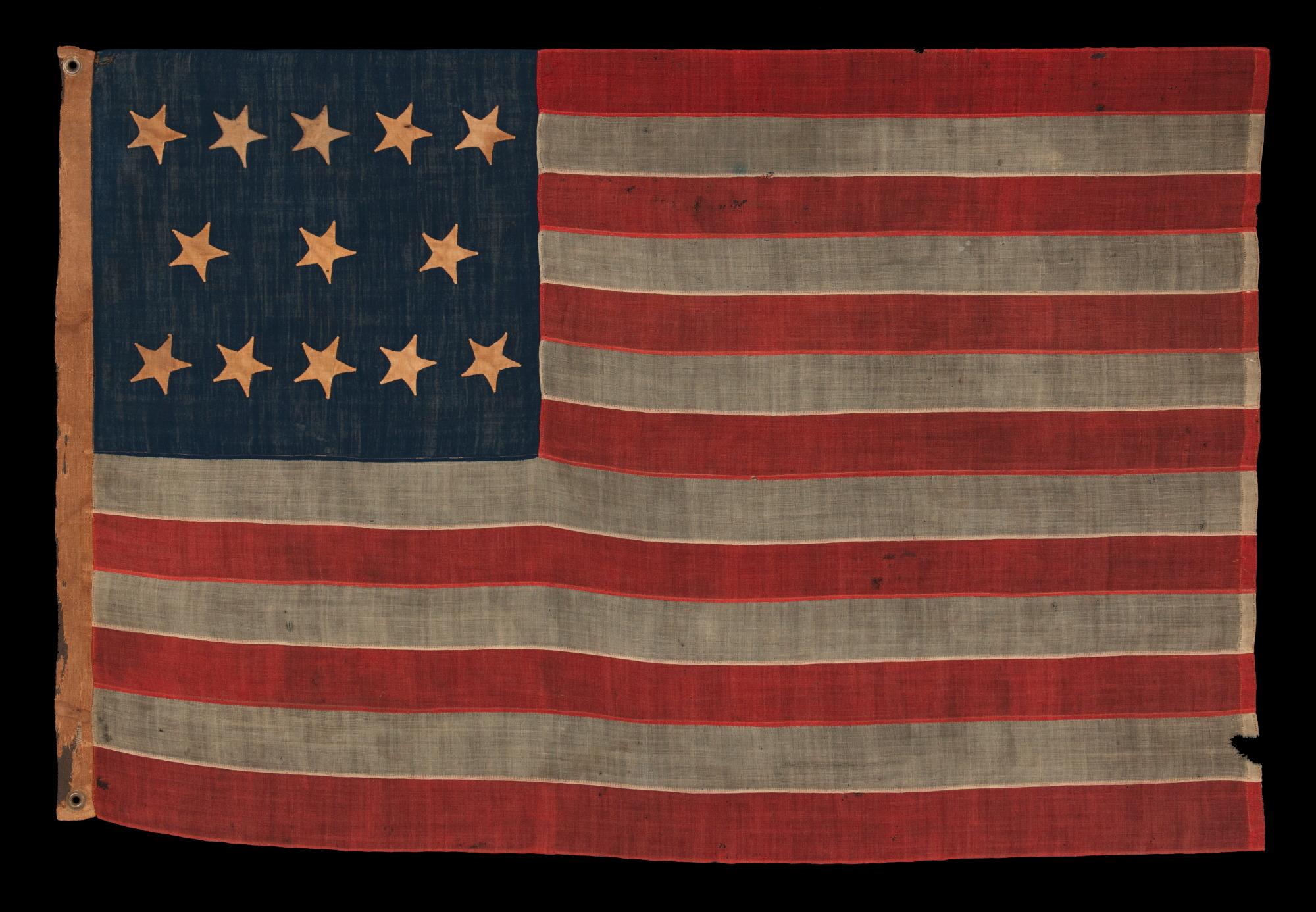Antique American flag with 13 hand-sewn stars in an extremely rare lineal configuration of 5-3-5, probably made with the intent of use by local militia or private outfitting of a volunteer company, civil war period, 1861-1865

We have made 13 star