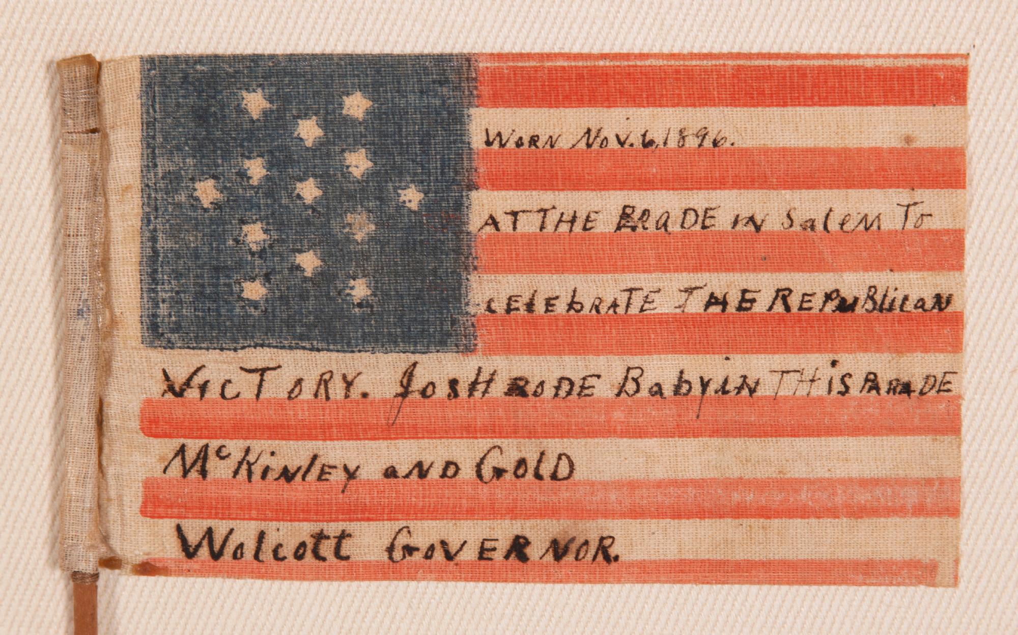 ANTIQUE AMERICAN FLAG WITH 13 STARS ARRANGED IN 6-POINTED GREAT STAR / STAR OF DAVID PATTERN, OF A TYPE MADE FOR THE 1876 CENTENNIAL OF AMERICAN INDEPENDENCE, WORN AND HAND-INSCRIBED BY THE OWNER IN 1896, IN SALEM, MASSACHUSETTS, IN CELEBRATION OF
