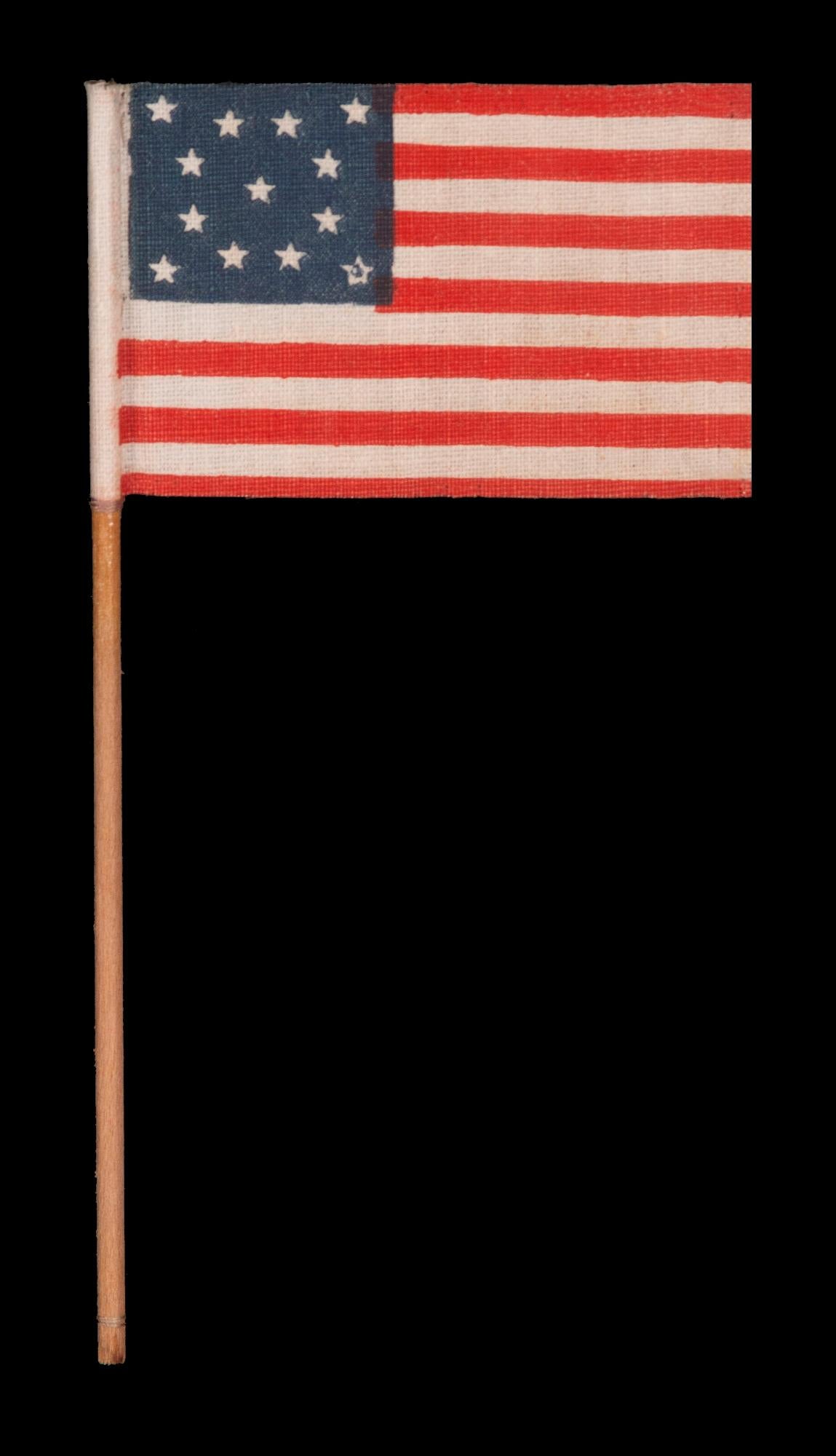 13 STARS IN A MEDALLION PATTERN ON AN ANTIQUE AMERICAN PARADE FLAG MADE BETWEEN APPROXIMATELY 1910 AND THE 1926 SESQUICENTENNIAL OF AMERICAN INDEPENDENCE

13 star American national parade flag, printed on oilcloth-like cotton, affixed to its