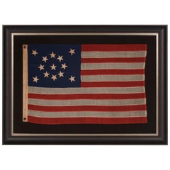 13 Stars in a Medallion Configuration on a Small-Scale American Flag Signed