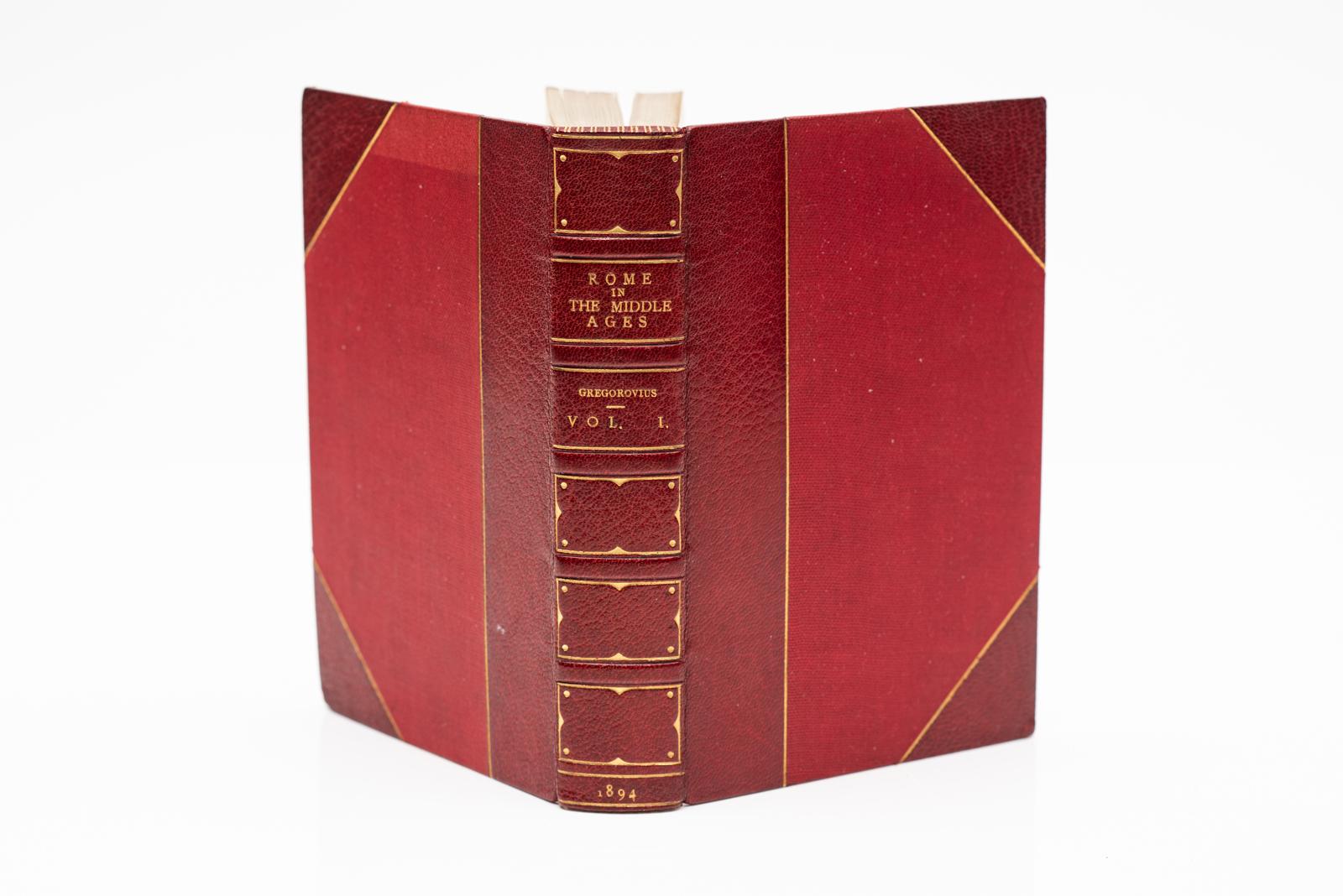 13 Vols. Ferdinand Gregorovius, History of The City of Rome in The Middle Ages. Bound in 3/4 red morocco, linen boards, top edges gilt, raised bands, gilt panels, marbled endpapers. Published London, George Ball & Sons 1894
H: 7 3/4