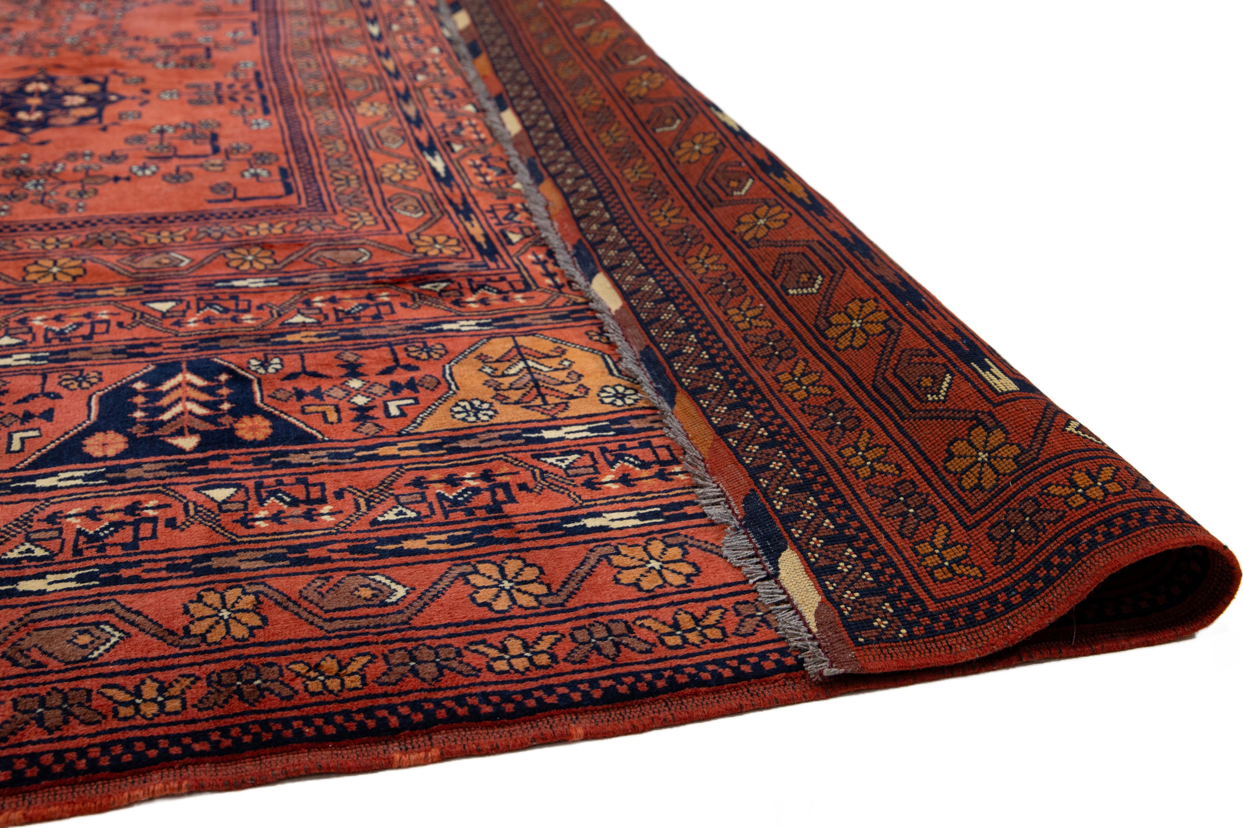 13 x 19 Vintage Handgeknüpfter afghanischer Wollteppich aus roter Afghanischer Wolle in Rot mit Blumenmotiv (Islamisch) im Angebot