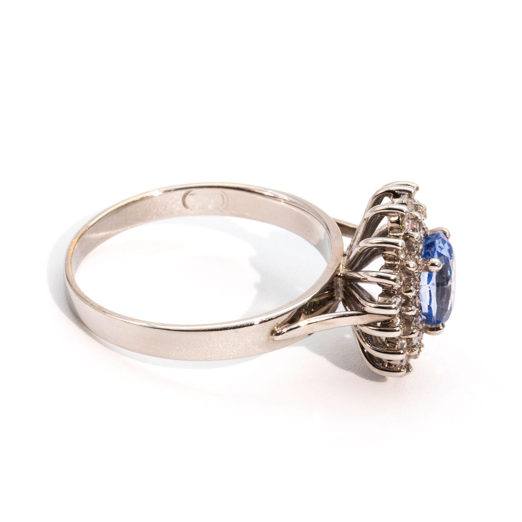 Oval Cut 1.30 Carat Bright Blue Sapphire and Diamond 18 Carat White Gold Cluster Ring