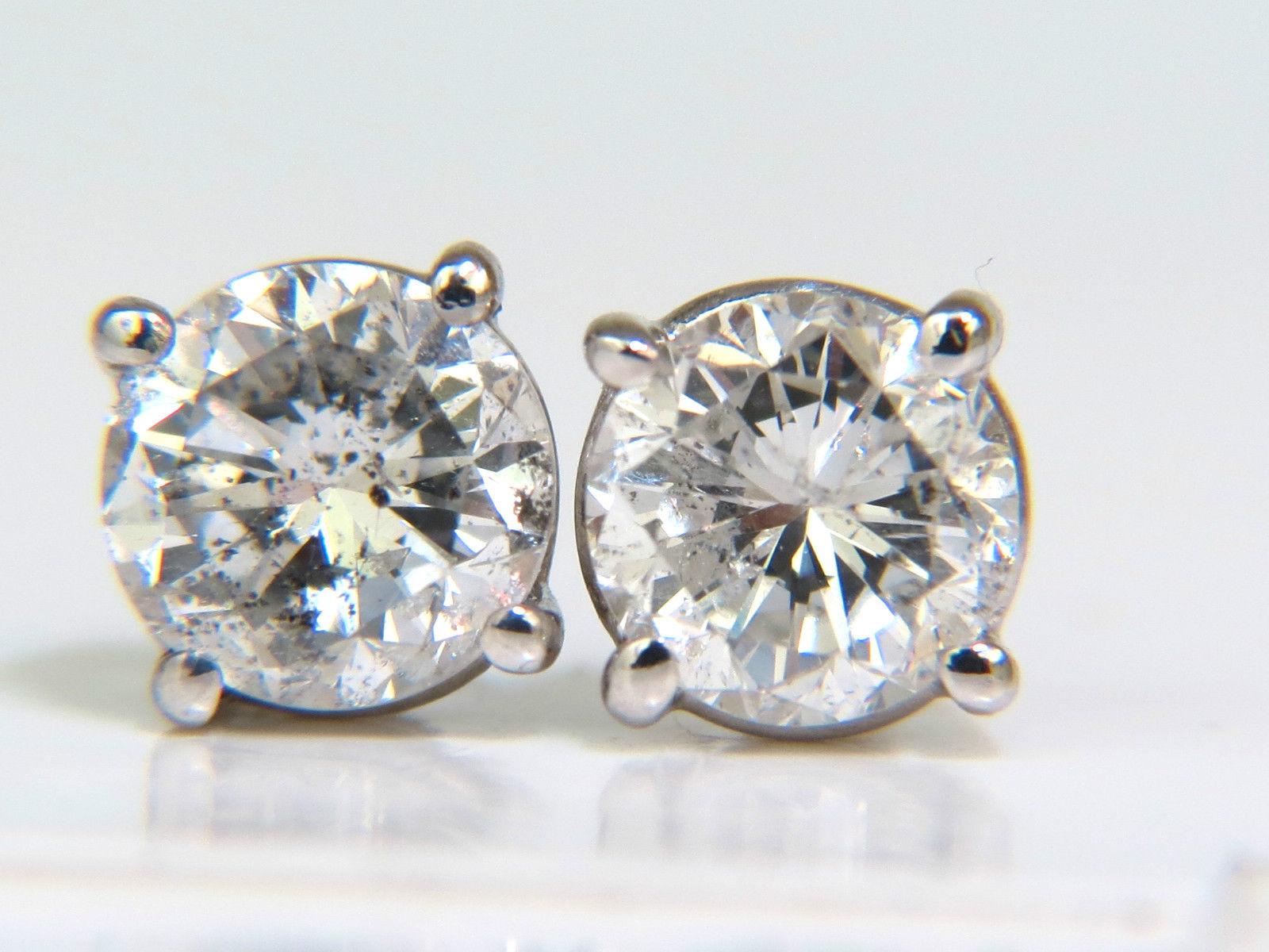 The Sparkles.

1.30ct. Round, Full cut diamond stud earrings.

 H-color, Si-2 Si-3 clarity.

Diamonds are with Top Cuts allowing maximum light for brilliance.

5.3mm wide

1.2 grams.

$5,000 appraisal will accompany