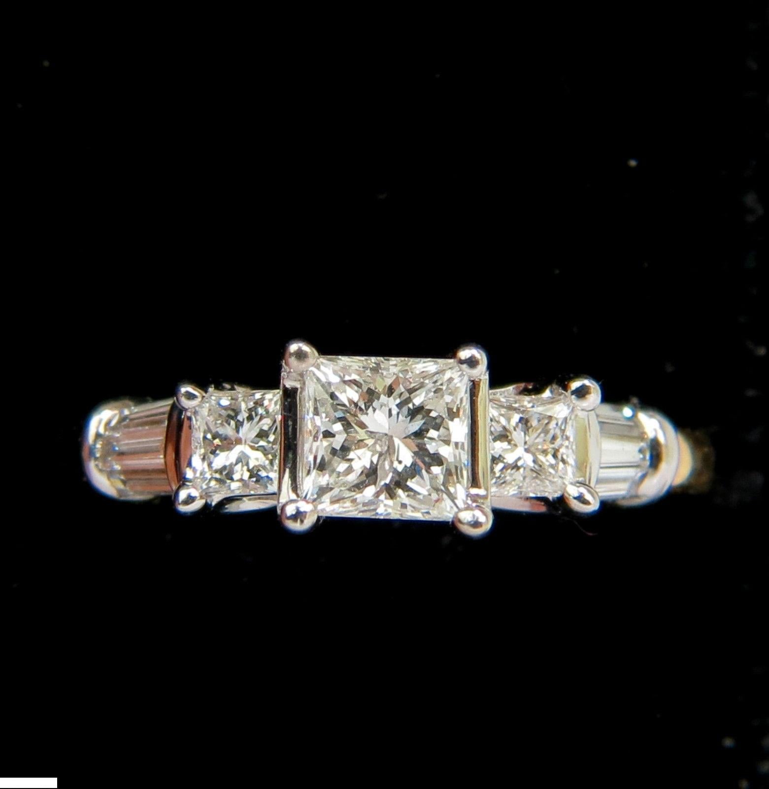 .65ct. Natural diamond ring.

Princess cut, Brilliant & full cut.

Durable mounted

I-color, Si-2 clarity.

Side diamonds:

.65ct. H-color, Si-1 clarity.

18kt. yellow / white gold. 

4.5 grams 

$5000 Appraisal to accompany 

Current size: 7.25 and