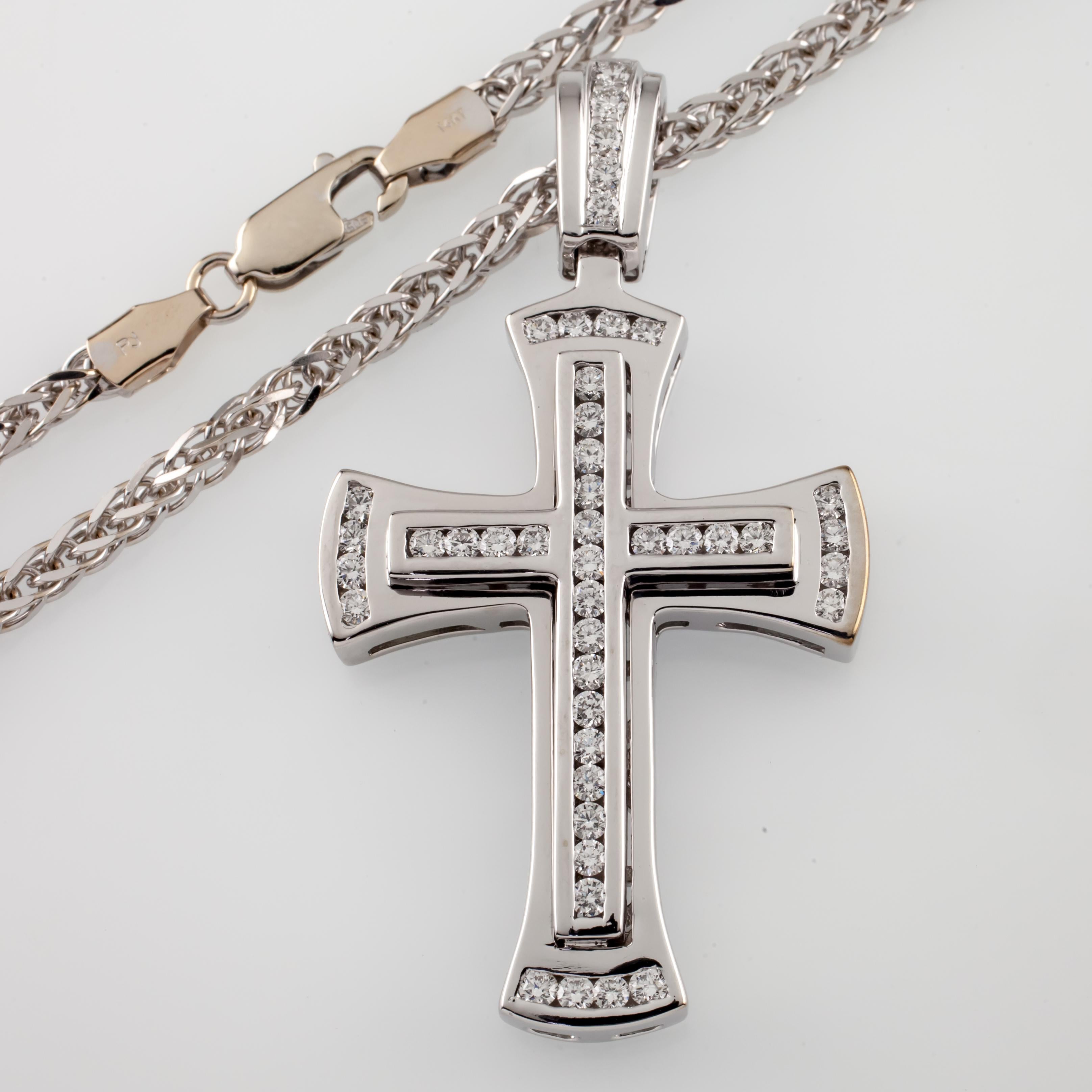 Gorgeous 14k White Gold Cross
Features Intersecting Rows of Channel-Set Round Diamonds
Each Point of Cross Features Rounded Row of Channel-Set Diamonds
Total Diamond Weight = 1.30 ct
Average Color = F
Average Clarity = VS/SI Clarity
Includes 24