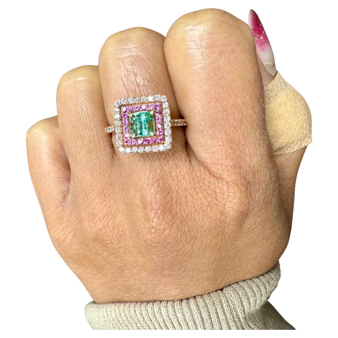 Modern 1.30 Carat Double Halo Emerald, Pink Sapphire and Diamond Rose Gold Bridal Ring For Sale