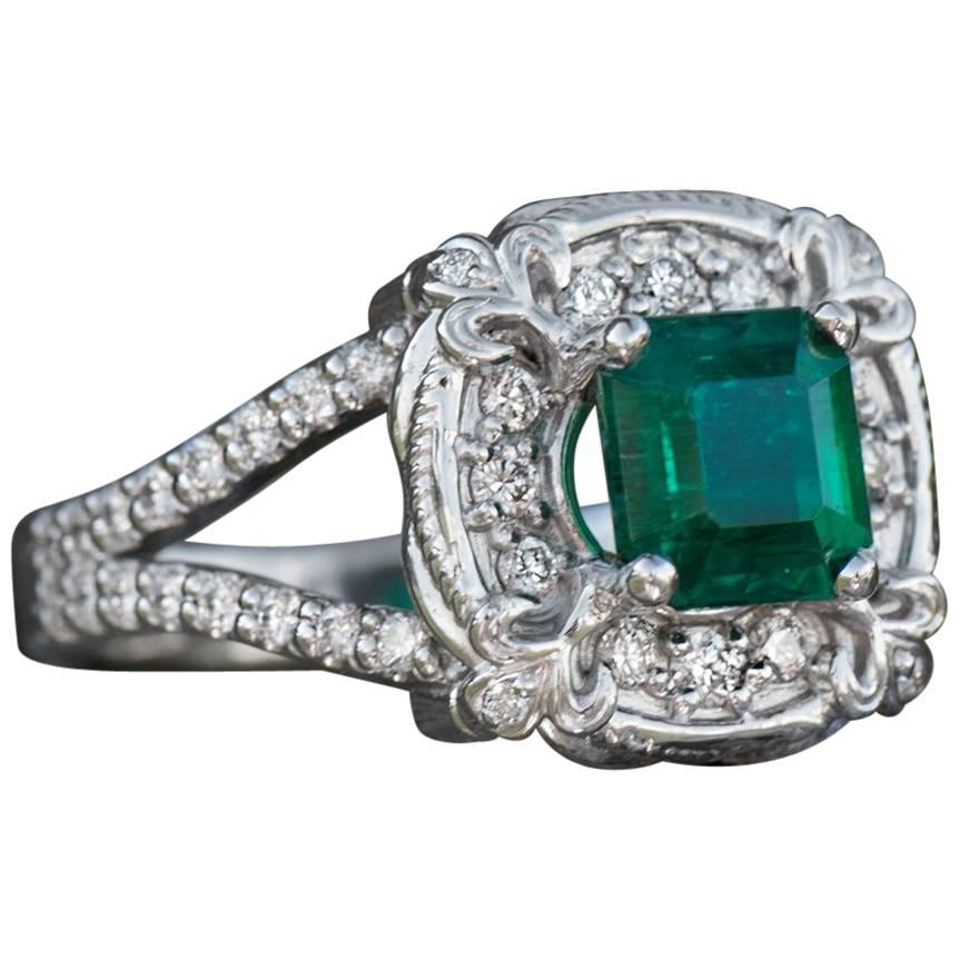 1.30 Carat Emerald and Diamond Theatre Ring in 14 Karat White Gold For Sale