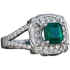 1.30 Carat Emerald and Diamond Theatre Ring in 14 Karat White Gold
