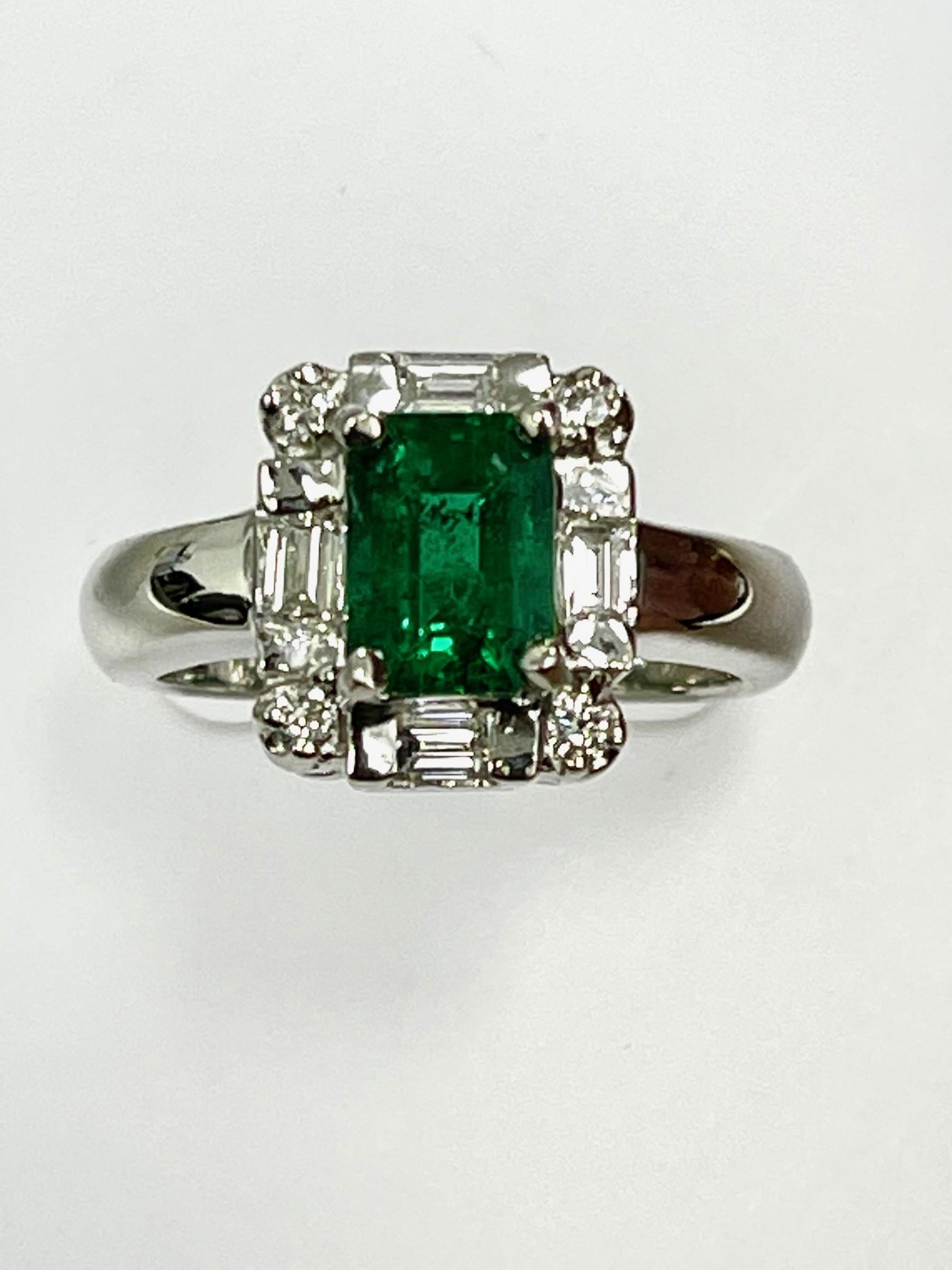 1.30 Carat Zambian Emerald cut emerald set in 18k whit gold ring 