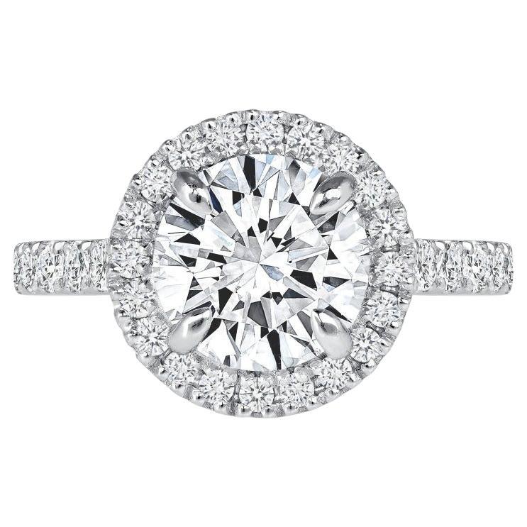 For Sale:  1.30 Carat Halo Design Round Cut Engagement Ring 4-Prong Setting