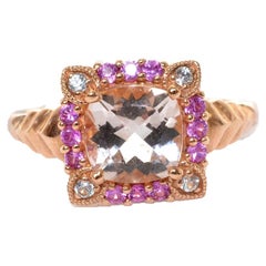 1.30 Carat Morganite, Pink Sapphire and White Sapphire Ring in 10krg