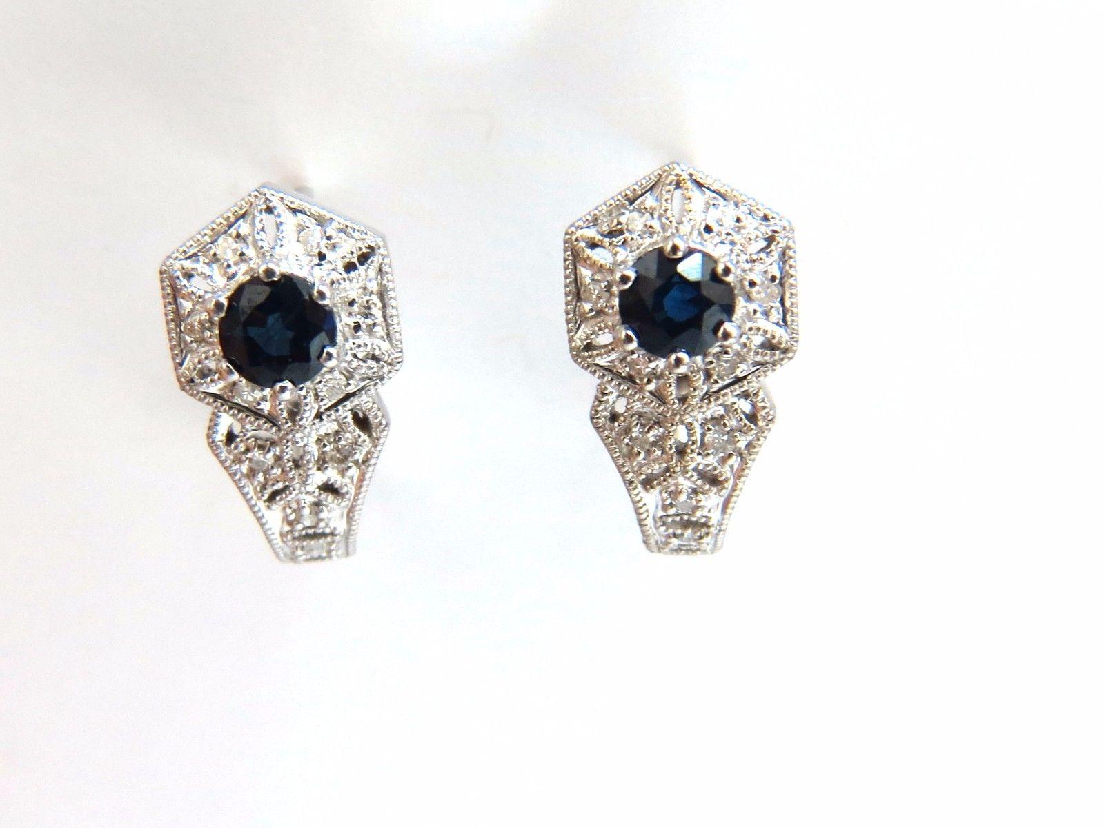 1.00ct. Natural blue sapphires lever clip earrings.

Sapphires: Round cut, transparent & clean clarity.

Range: 4mm each.

.30ct natural round, brilliant diamonds:

H-color Vs-2 clarity.

14kt. white gold

4 grams.

Measurement overall: .61 inch