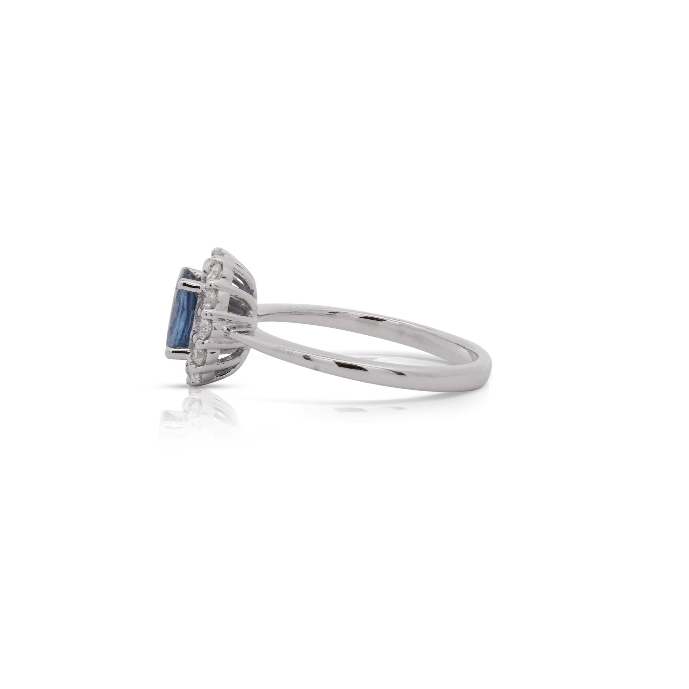 Oval Cut 1.30 Carat Oval Deep Blue Sapphire & Round Diamond 18K White Gold Ring For Sale