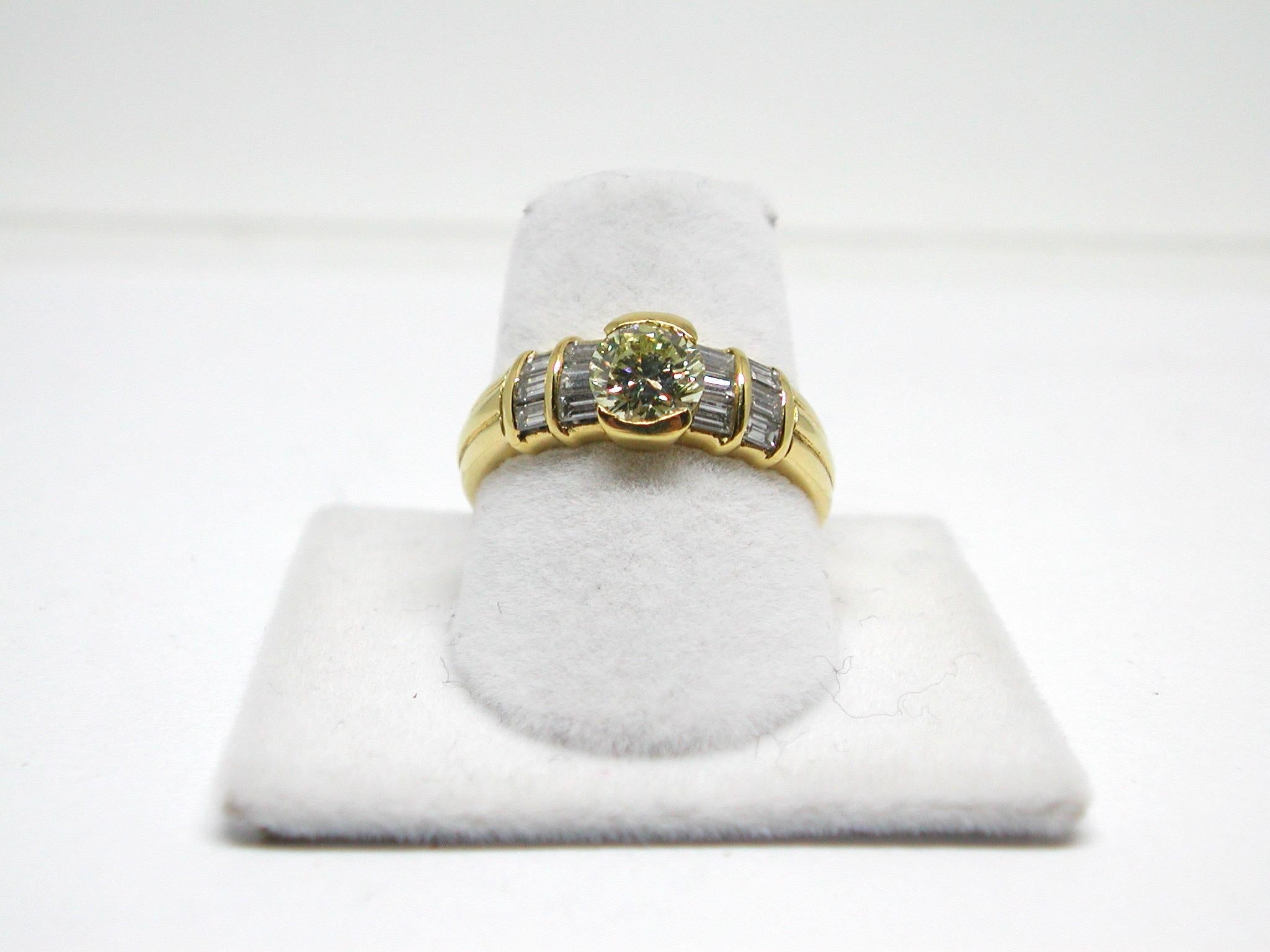 Round Cut 1.30 Carat Yellow Gold Fancy Yellow Diamond Ring For Sale