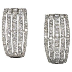 1.30 Carat Huggies Diamond Earrings Set in 18 Carats White Gold Omega Closure