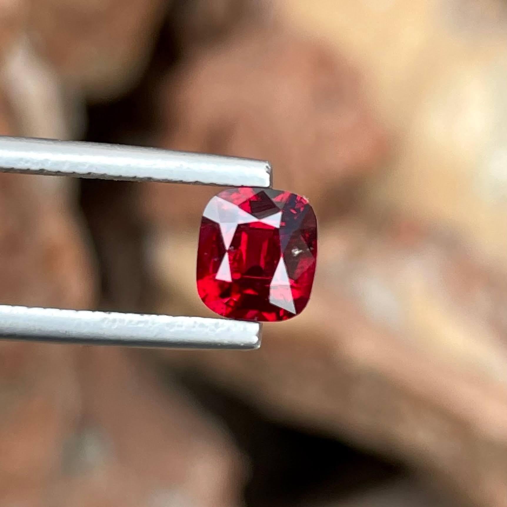 Weight 1.30 carats 
Dimensions 6.39x5.78x4.00 mm
Treatment none 
Origin Burma 
Clarity VVS
Shape cushion 
Cut fancy cushion 




Behold the allure of this exquisite 1.30 carats Natural Red Burmese Spinel, a gemstone of unparalleled beauty and