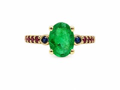 Anello Cocktail con smeraldo da 1,30 carati e accenti di zaffiro e rubino Anello con smeraldo in oro 14k
