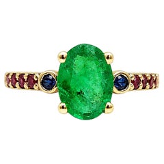 Anello Cocktail con smeraldo da 1,30 carati e accenti di zaffiro e rubino Anello con smeraldo in oro 14k