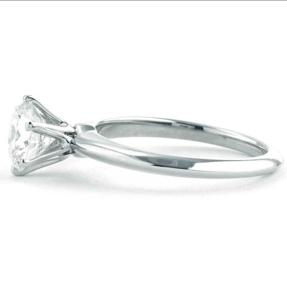 Contemporary 1.30 CT. Tiffany & Co. Round Diamond Solitaire Engagement Ring In Platinum For Sale