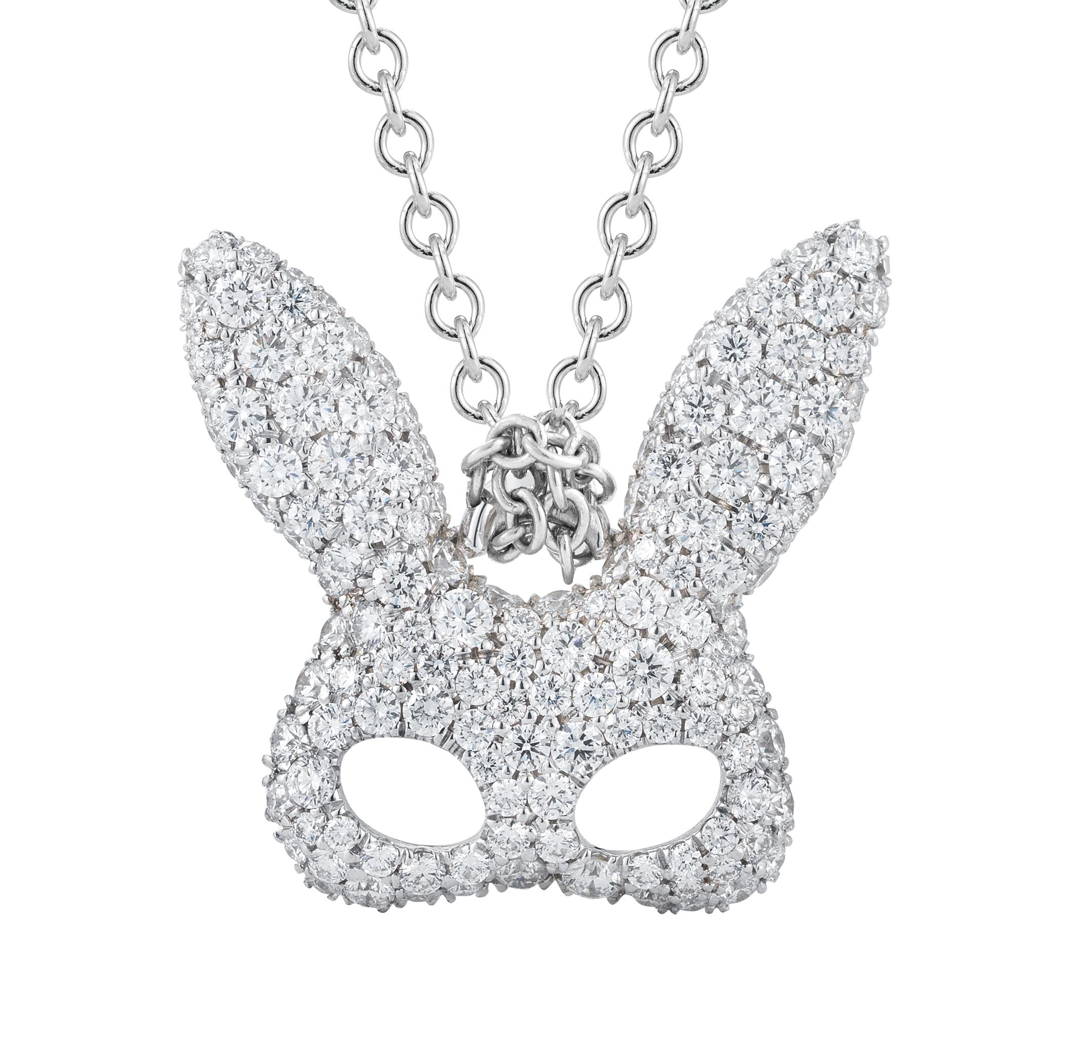 This super cute 18k white gold rabbit mask is set with mixed sized pave diamonds. The diamonds total 1.30 carats total and the pendant hangs from an 18